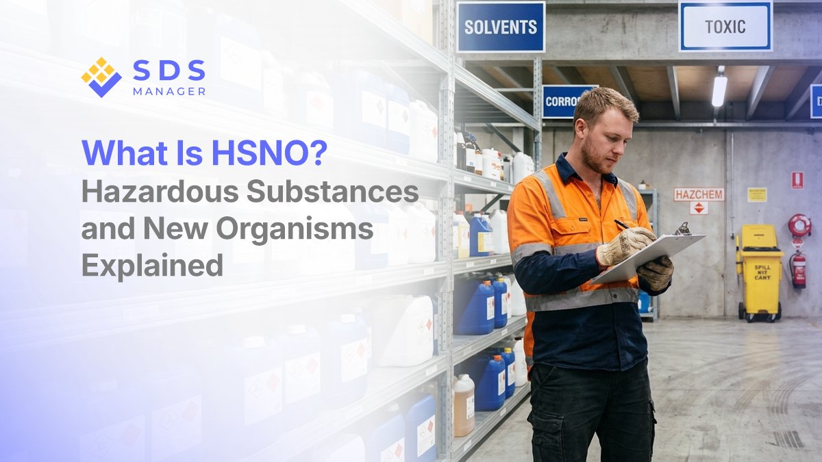 Worker conducting a hazardous substance inventory check in a New Zealand chemical storage warehouse with Solvents Toxic and Corrosives zone signage